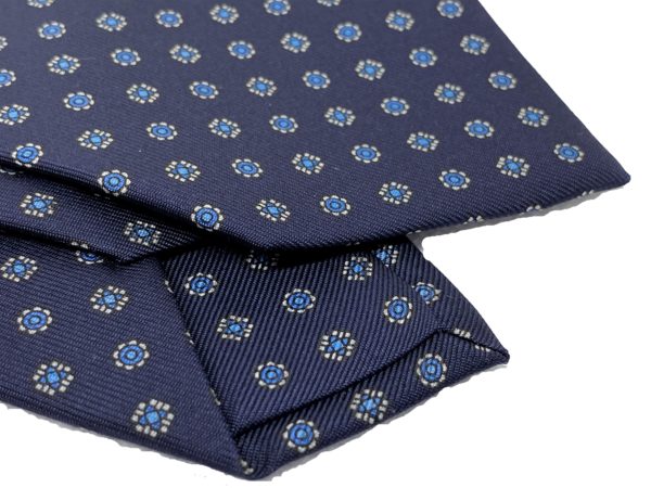 3-fold navy with sky blue and white motif tie